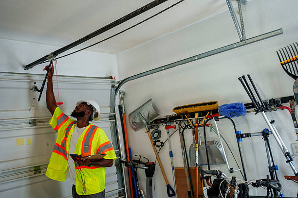 Professional Garage Door Panel Replacement technician working in Rutland County County, VT